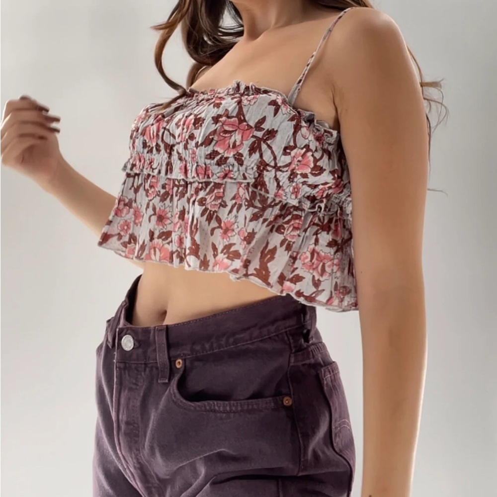 Free People cropped tank top with smocking‎ in floral print.